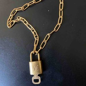 Louis Vuitton vintage padlock necklace gold 16in chain lock and key authentic